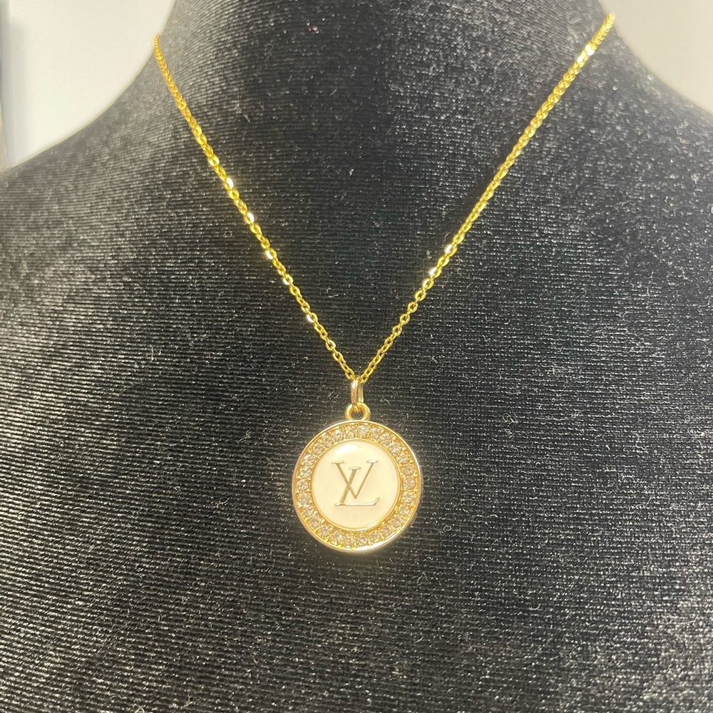 Louis Vuitton zipper pull - authentic- on 18” sterling silver chain